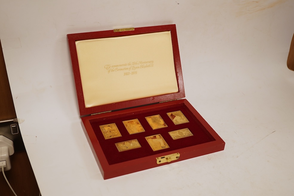 Hallmark Collections, 'The Coronation Issue 1953-1978' Collection of seven silver gilt replica stamps, in case with certificate